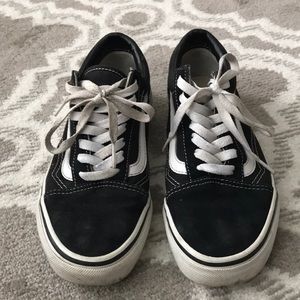 Woman’s black vans